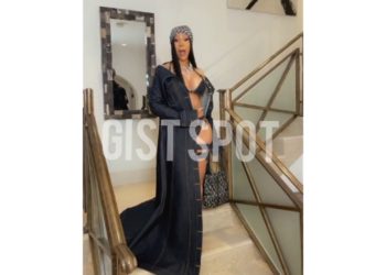 Cardi b dressed in sticker outfit announces new single #Up