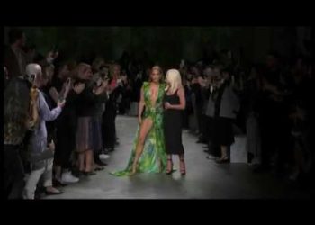 J Lo wows Versace crowd with runway appearance