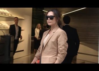 Victoria Beckham poses for photographers at her own first ever fashion show at 2018 London Fashion W