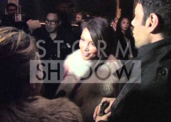 Puff Daddy and Kim Kardashian at the Kanye West fashion show in Paris