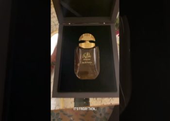 Conor mcgregor sprays a perfume