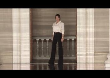 Models and designer on the runway for the Victoria Beckham Fashion Show in London