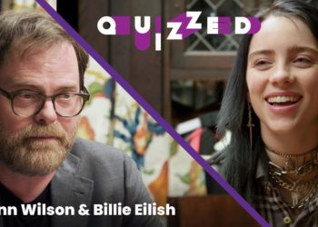 Billie Eilish gets QUIZZED by Rainn Wilson on ‘The Office' | Billboard