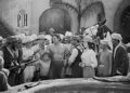Johnny Weissmuller Being Seized by Armed Men in a Classic Movie Scene Photo Print (30 x 24)